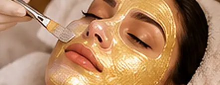 Client wearing a golden brightening mask